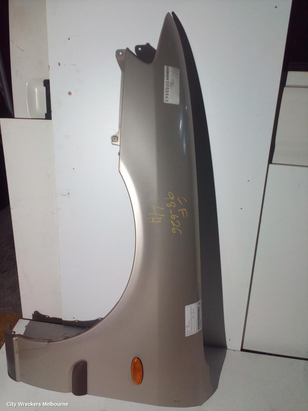 MAZDA 626 LEFT GUARD, GF, SEDAN/HATCH, GLUED ON MOULD, W/ REPEATER TYPE, 08/1997 - 11/1999