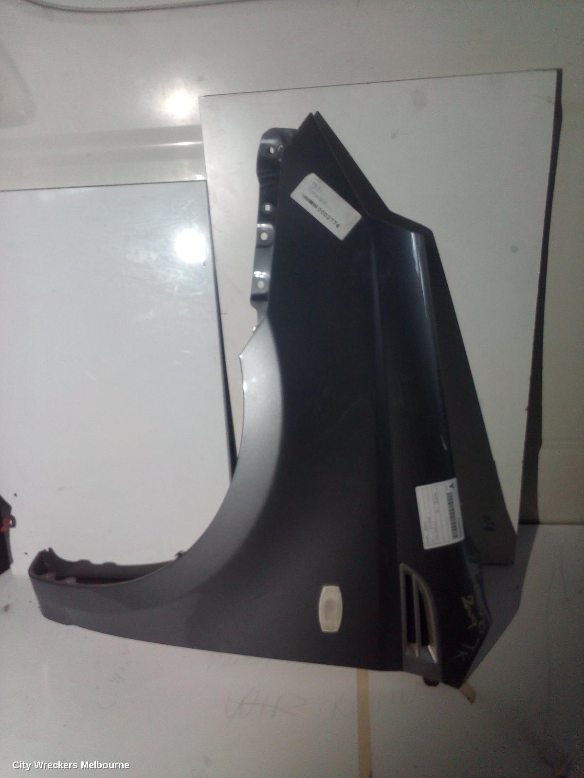 HOLDEN BARINA LEFT GUARD, TK, HATCH, 07/2008 - 12/2012
