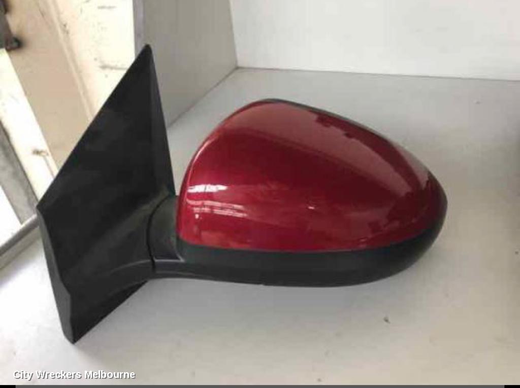 HOLDEN BARINA LEFT DOOR MIRROR, TM, COLOUR CODED, 09/2011 - 12/2018