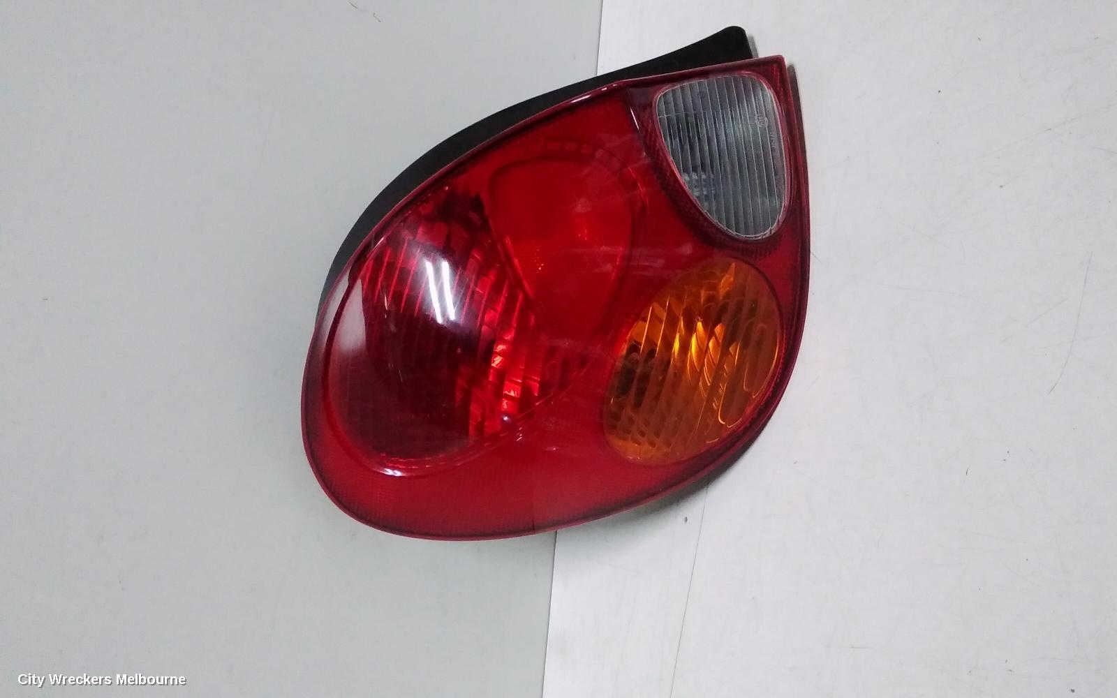 TOYOTA COROLLA LEFT TAILLIGHT, AE112, SECA, KOITO 12-441, 10/1999 - 11/2001