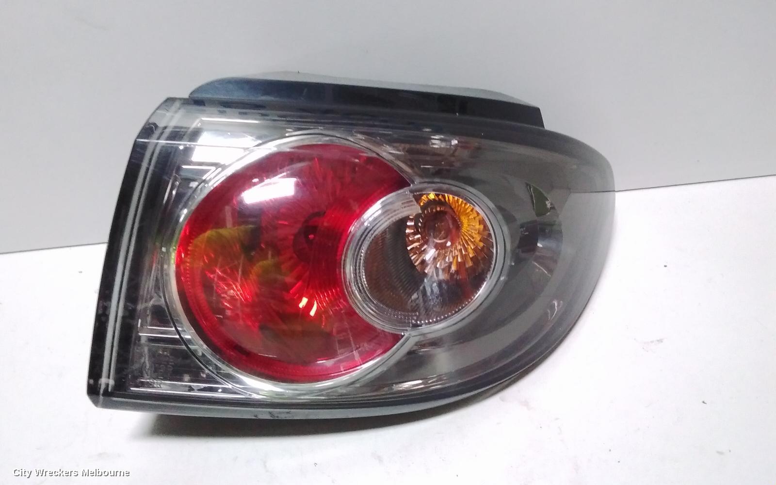 MAZDA 2 RIGHT TAILLIGHT, DY SERIES, GENKI, BLACK INSERT, 06/2005 - 08/2007