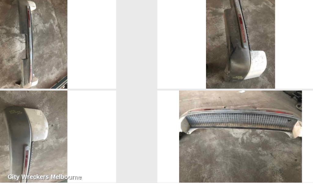 MITSUBISHI L300 REAR BUMPER, SJ-SK, COMPLETE, 3 PIECES, REFLECTOR ON ENDS TYPE, 09/1994 - 12/2013