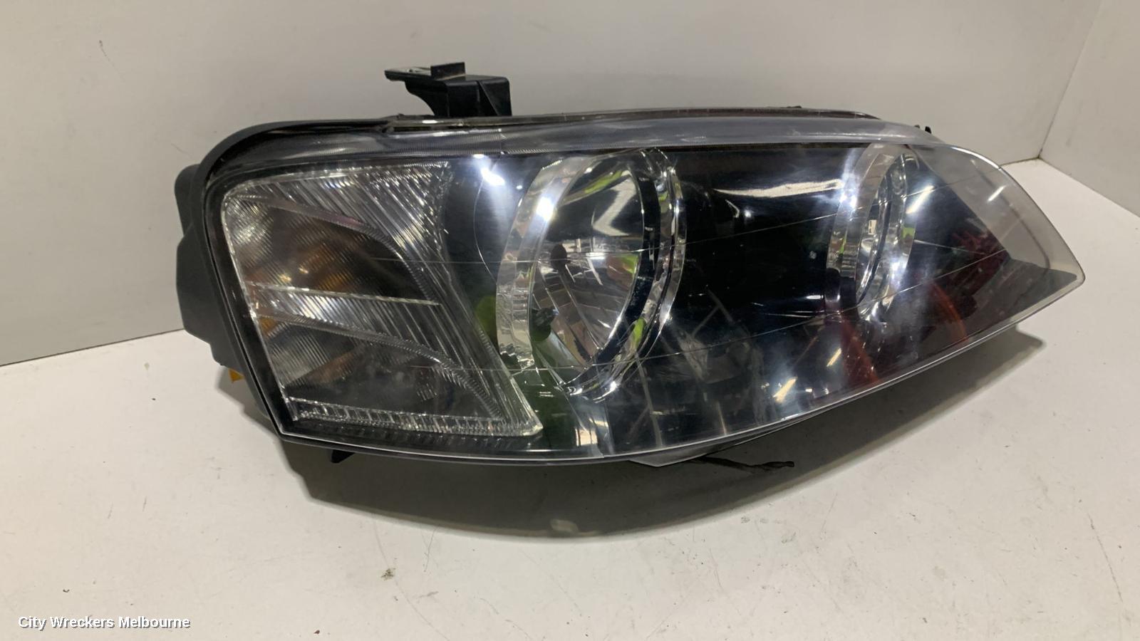 FORD FALCON RIGHT HEADLAMP, BA-BF1, XT, BLACK INSERT TYPE, 10/2002 - 08/2006
