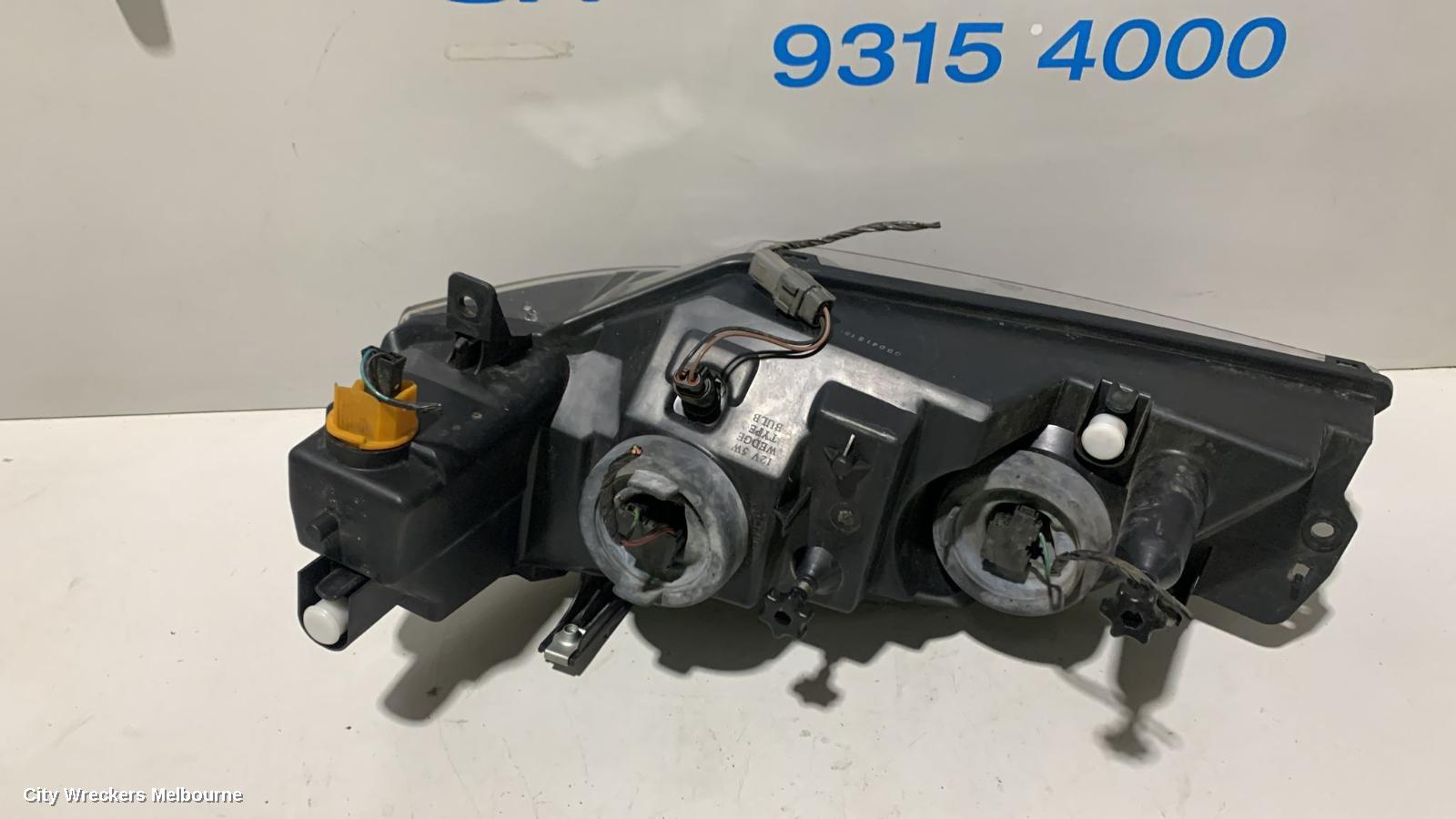 FORD FALCON RIGHT HEADLAMP, BA-BF1, XT, BLACK INSERT TYPE, 10/2002 - 08/2006