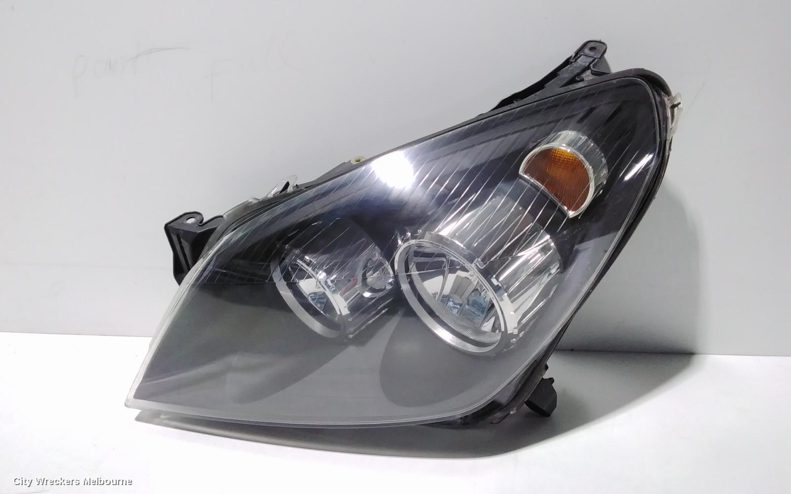 HOLDEN ASTRA LEFT HEADLAMP, AH, BLACK INSERT TYPE, 10/2004 - 08/2009