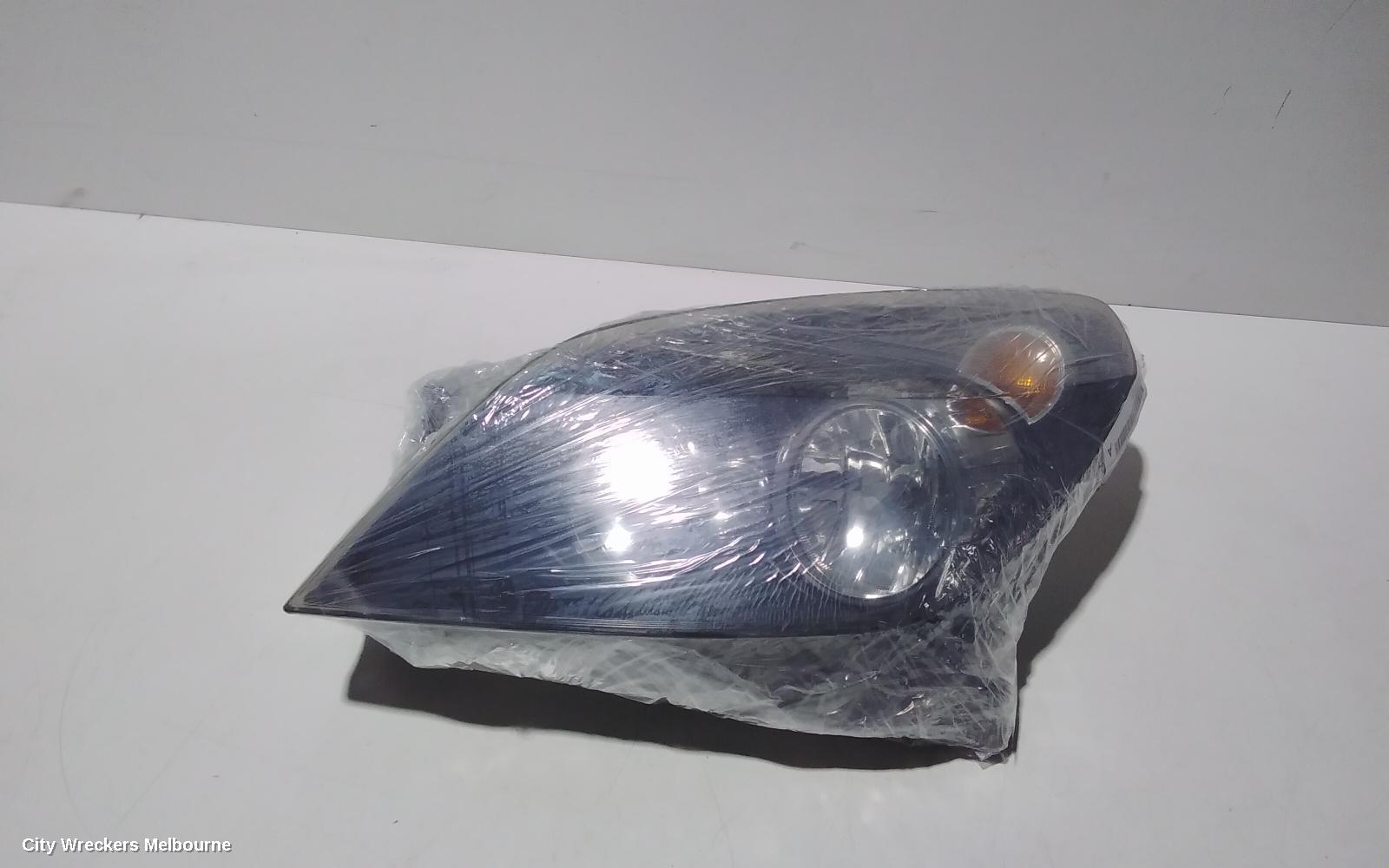 HOLDEN ASTRA LEFT HEADLAMP, AH, BLACK INSERT TYPE, 10/2004 - 08/2009