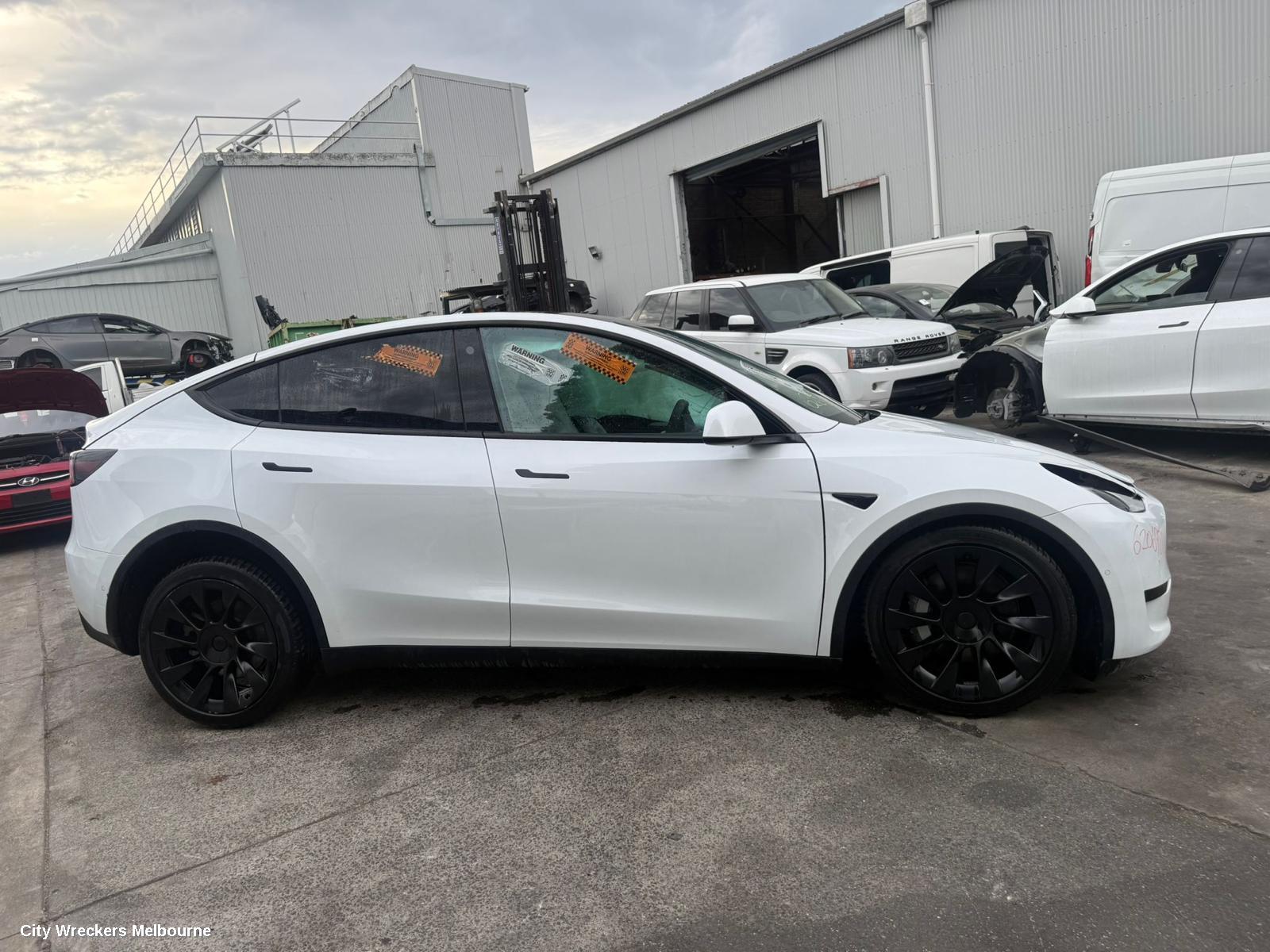 TESLA MODEL Y CONSOLE, 1ST GEN, 03/2022 ONWARDS