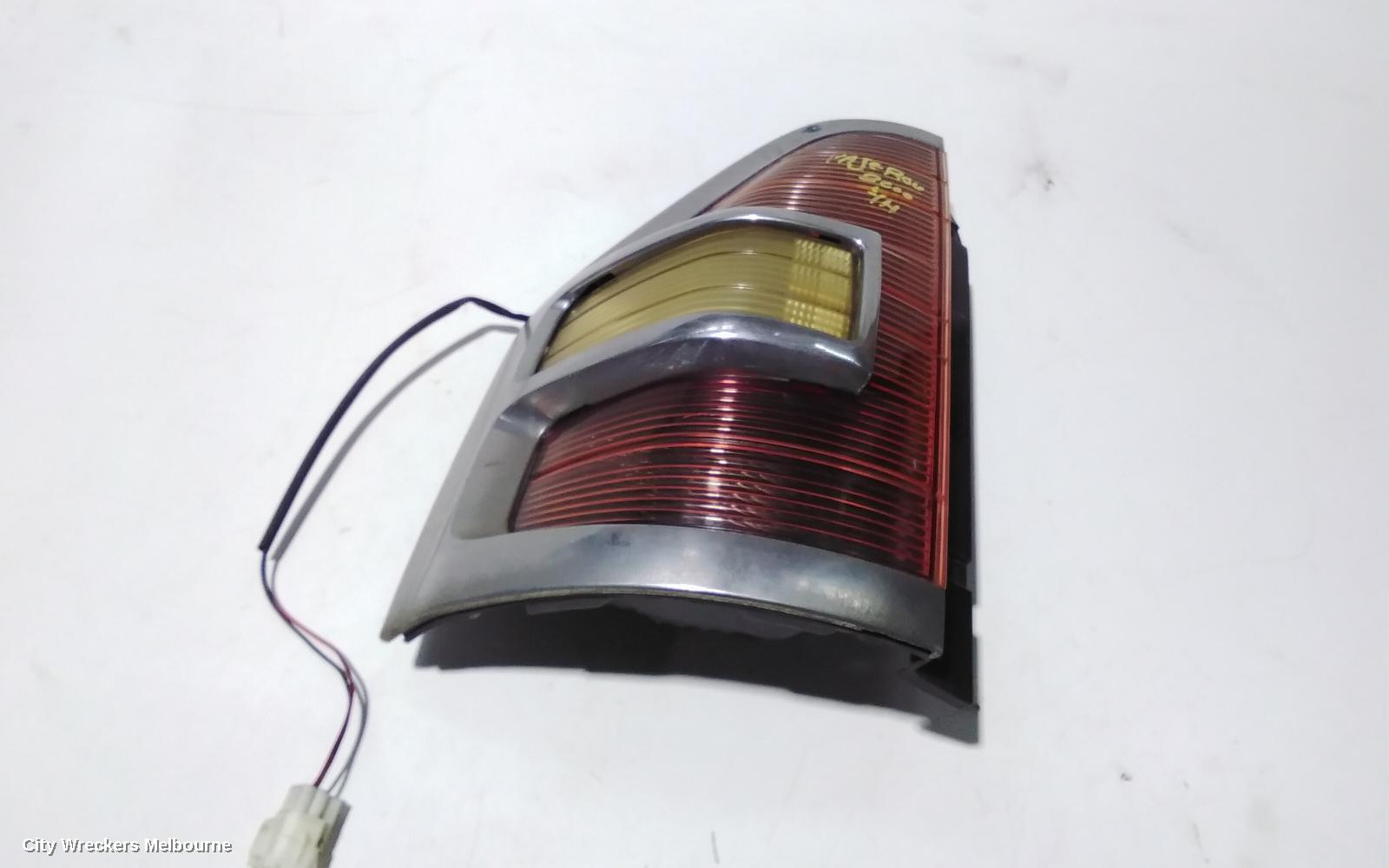 MITSUBISHI PAJERO LEFT TAILLIGHT, NM, IN BODY, CHROME SURROUND TYPE, 05/2000 - 10/2002