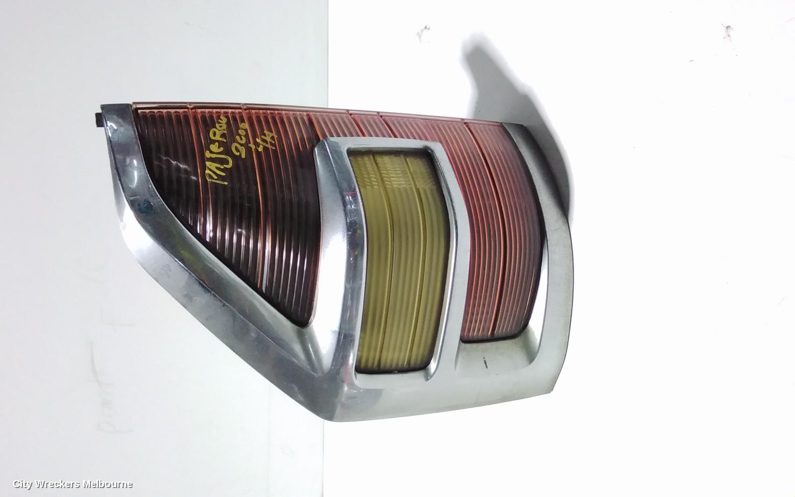 MITSUBISHI PAJERO LEFT TAILLIGHT, NM, IN BODY, CHROME SURROUND TYPE, 05/2000 - 10/2002