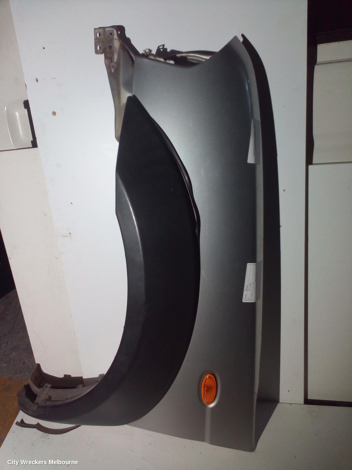 NISSAN NAVARA LEFT GUARD, D22, FLARED TYPE, 12/2001 - 11/2008