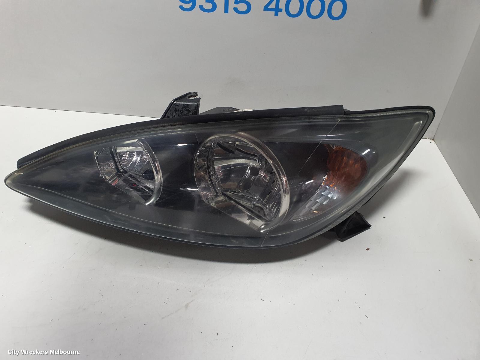 TOYOTA CAMRY LEFT HEADLAMP, SK36, SPORTIVO, BLACK INSERT TYPE, 08/2002 - 09/2004