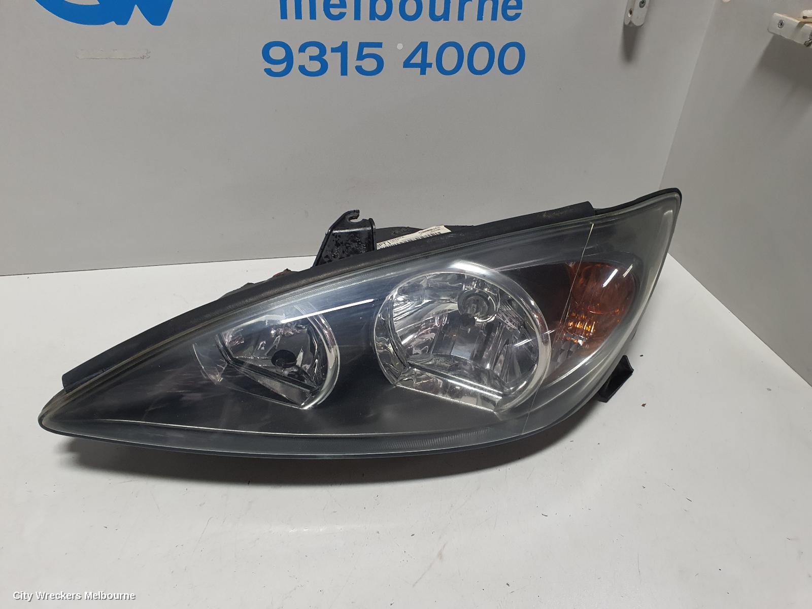 TOYOTA CAMRY LEFT HEADLAMP, SK36, SPORTIVO, BLACK INSERT TYPE, 08/2002 - 09/2004