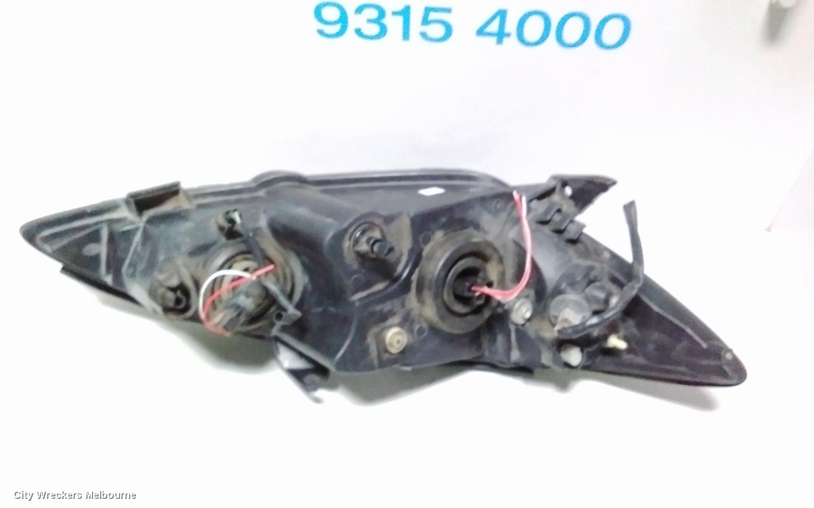 TOYOTA CAMRY LEFT HEADLAMP, SK36, SPORTIVO, BLACK INSERT TYPE, 08/2002 - 09/2004
