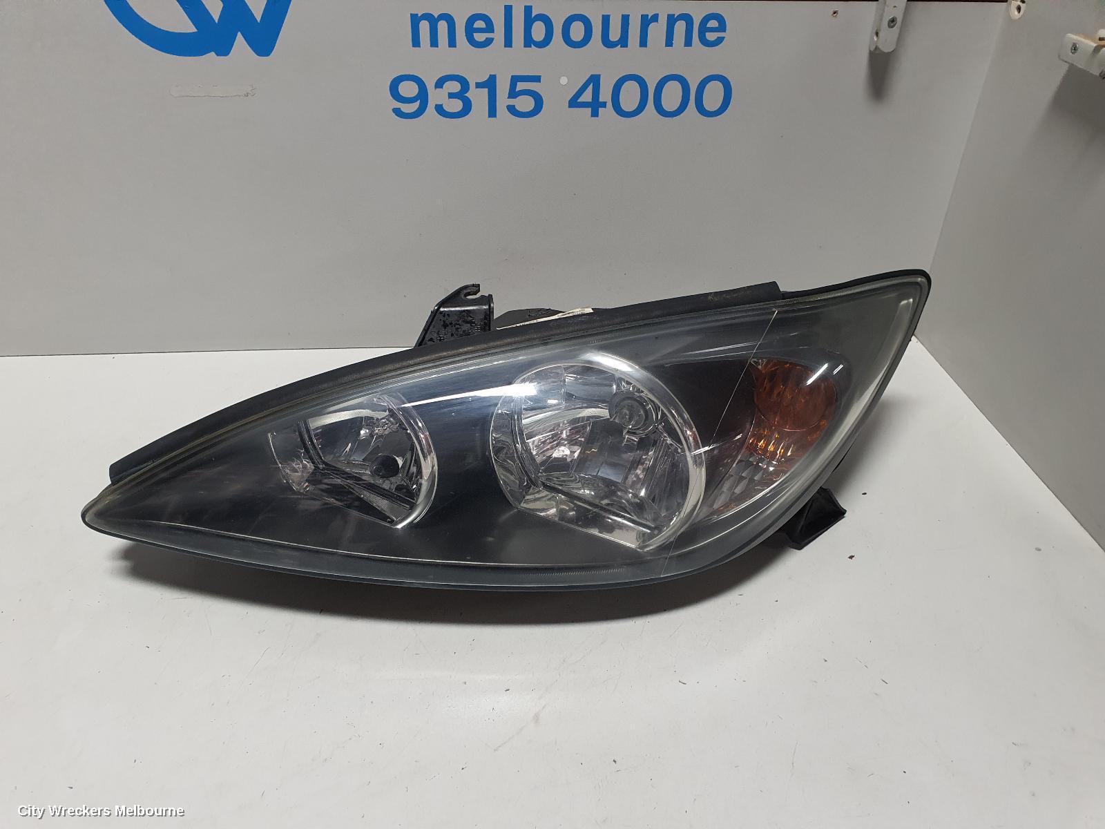 TOYOTA CAMRY LEFT HEADLAMP, SK36, SPORTIVO, BLACK INSERT TYPE, 08/2002 - 09/2004