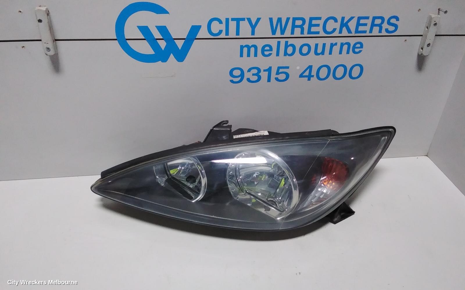 TOYOTA CAMRY LEFT HEADLAMP, SK36, SPORTIVO, BLACK INSERT TYPE, 08/2002 - 09/2004