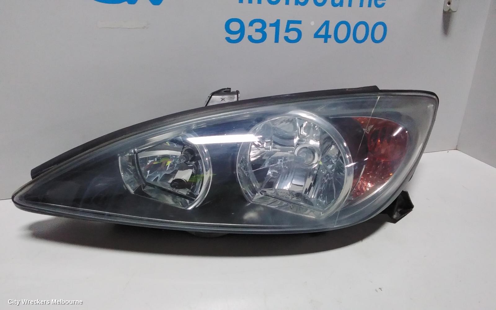 TOYOTA CAMRY LEFT HEADLAMP, SK36, SPORTIVO, BLACK INSERT TYPE, 08/2002 - 09/2004