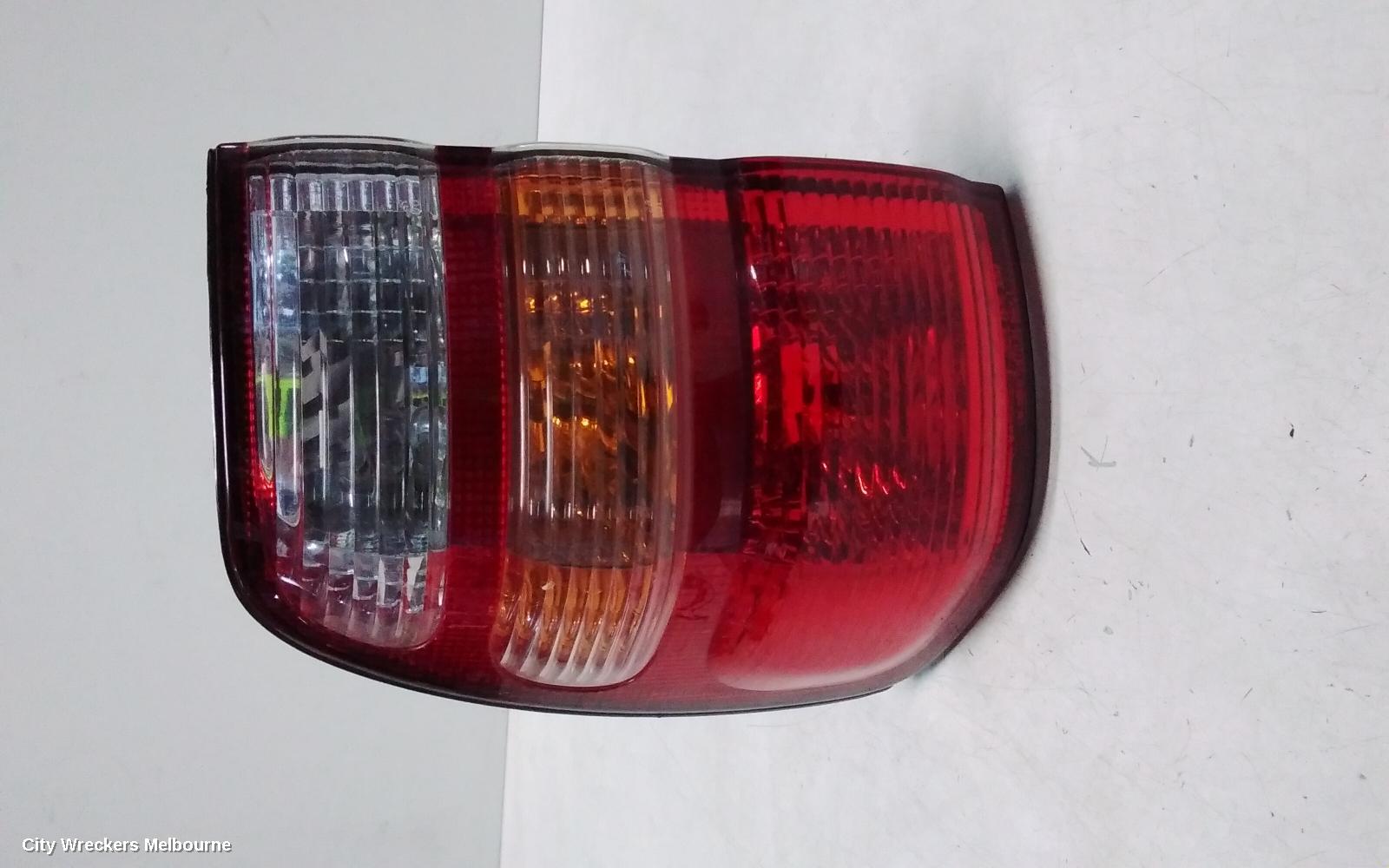 TOYOTA LANDCRUISER LEFT TAILLIGHT, 100 SERIES, KOITO LENS# 60-70, 01/1998 - 10/2002