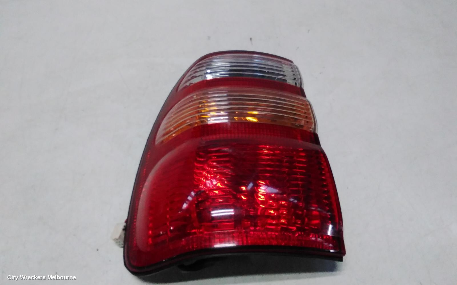 TOYOTA LANDCRUISER LEFT TAILLIGHT, 100 SERIES, KOITO LENS# 60-70, 01/1998 - 10/2002