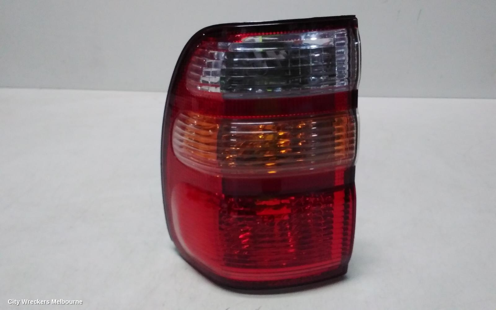TOYOTA LANDCRUISER LEFT TAILLIGHT, 100 SERIES, KOITO LENS# 60-70, 01/1998 - 10/2002