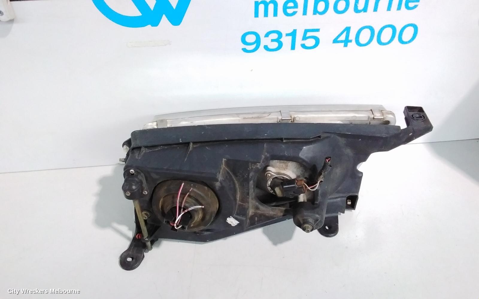 TOYOTA AVALON RIGHT HEADLAMP, MCX10R, HELLA LENS# 07-29, 07/2000 - 09/2003