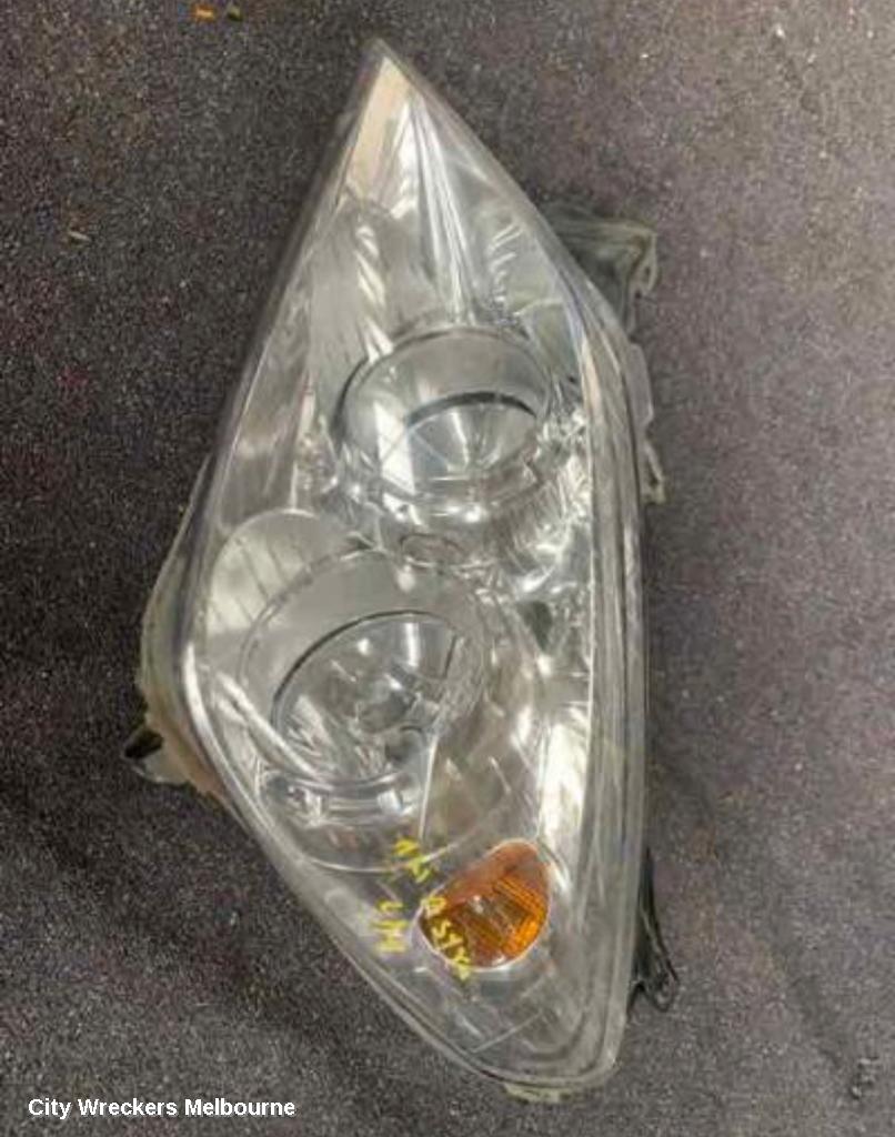 HOLDEN ASTRA LEFT HEADLAMP, AH, CHROME INSERT TYPE, 10/2006 - 08/2009