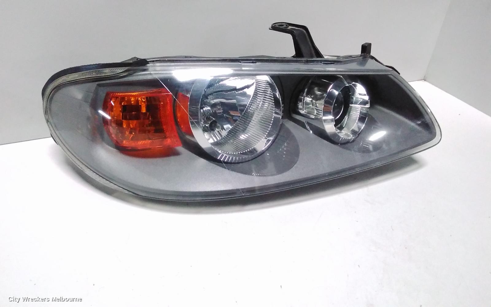 NISSAN PULSAR RIGHT HEADLAMP, N16, HATCH, 1 PIECE H/LAMP + C/LIGHT, GREY BACKING TYPE, 06/2001 - 12/2005