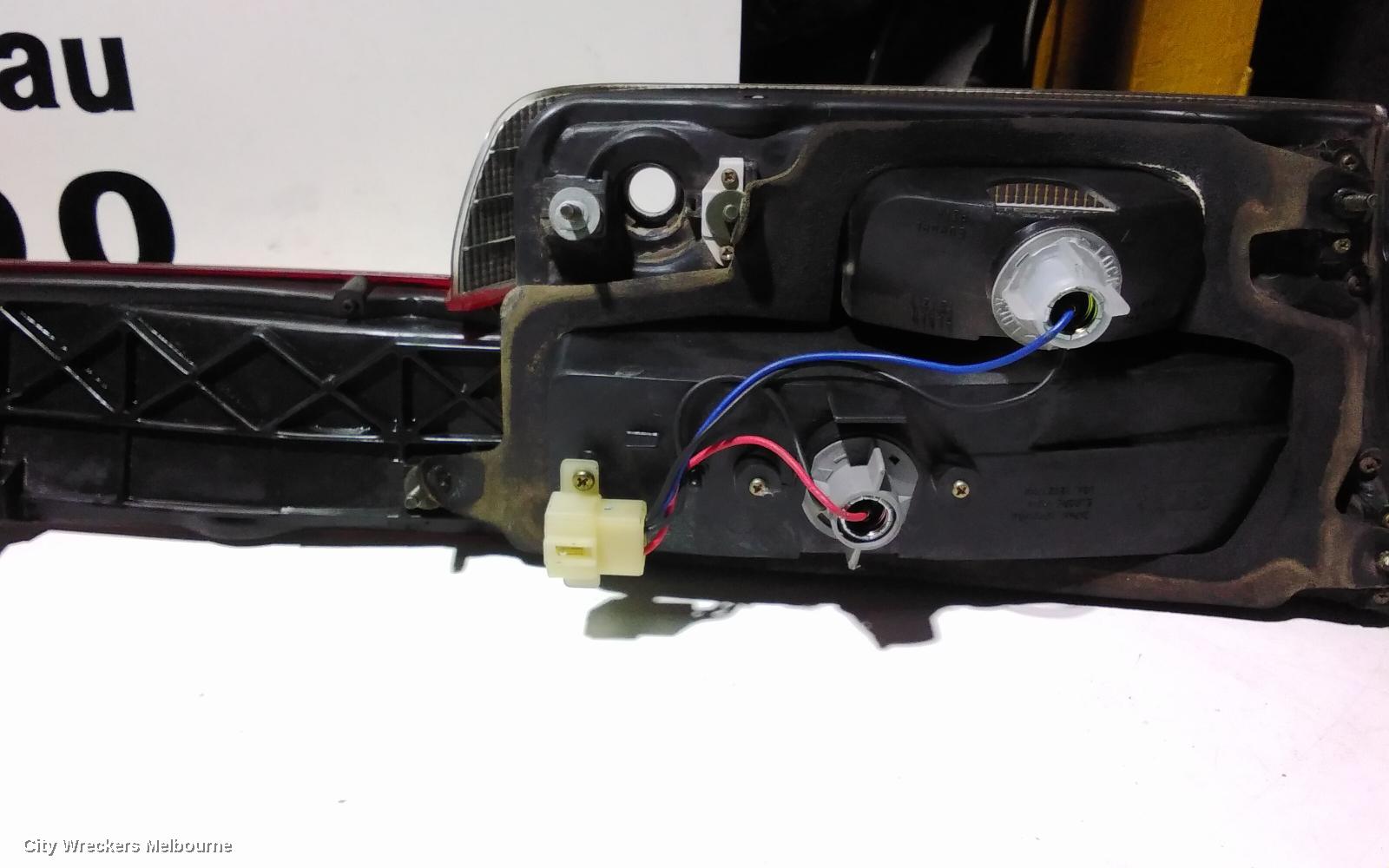 SUBARU LIBERTY REAR GARNISH, BOOTLID LAMP, 3RD GEN, SEDAN, 11/1998 - 08/2003