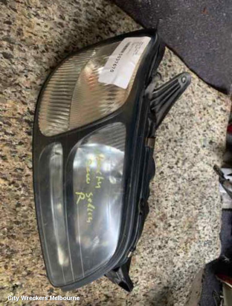 SUBARU LIBERTY RIGHT HEADLAMP, 3RD GEN, BLACK INSERT, 11/1998 - 06/2001