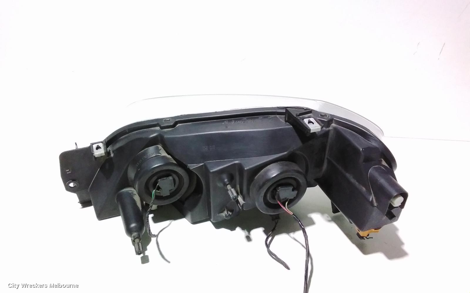 FORD TERRITORY RIGHT HEADLAMP, SX-SY MKI, TS/GHIA/GHIA TURBO, CHROME INSERT, 05/2004 - 04/2009