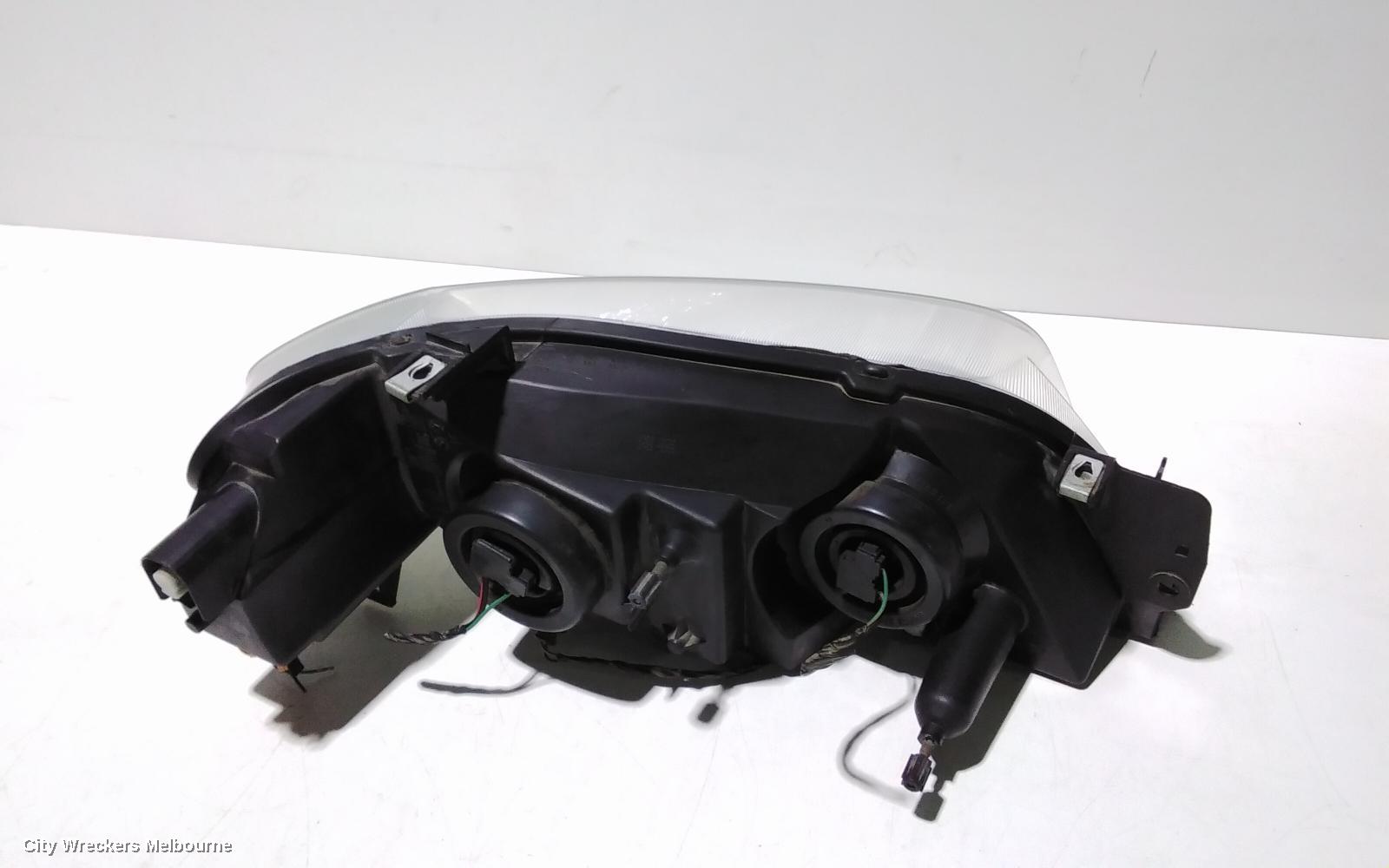FORD TERRITORY LEFT HEADLAMP, SX-SY MKI, TX/TURBO/SR, BLACK INSERT, 05/2004 - 04/2009