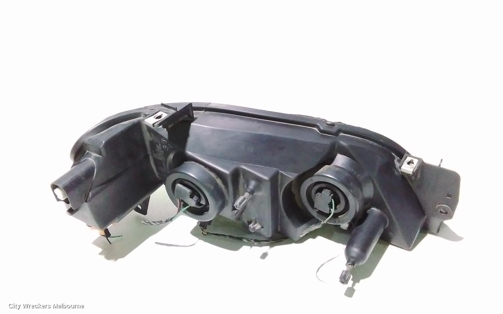 FORD TERRITORY LEFT HEADLAMP, SX-SY MKI, TX/TURBO/SR, BLACK INSERT, 05/2004 - 04/2009