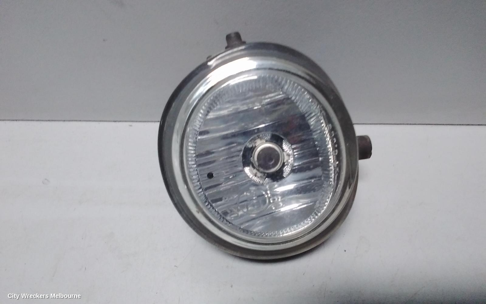 MAZDA 3 RIGHT INDICATOR/FOG/SIDE, BUMPER FOGLAMP, BK, ROUND TYPE, LENS# 114-61009, 10/2003 - 04/2009