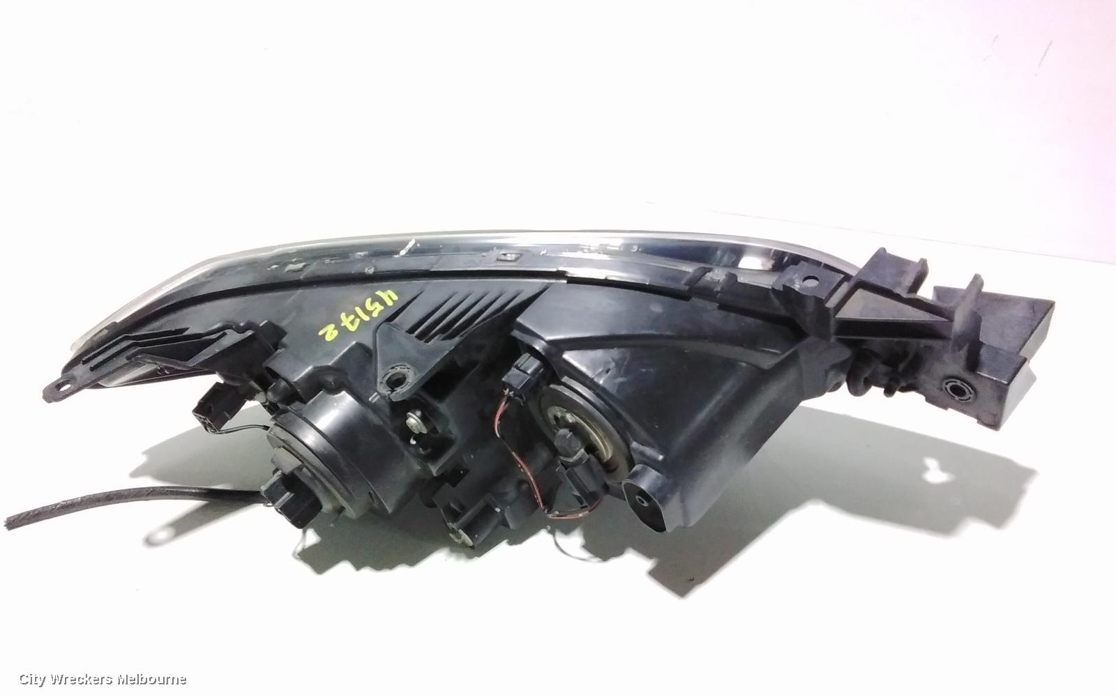 MAZDA 3 LEFT HEADLAMP, BK, SEDAN, NON HID, MANUAL ADJUST TYPE, 10/2003 - 04/2009