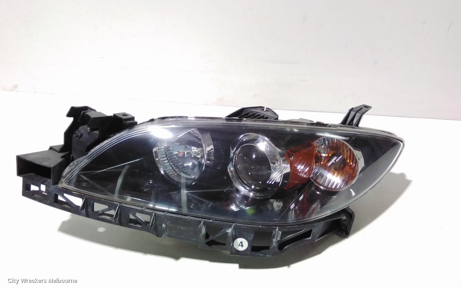 MAZDA 3 LEFT HEADLAMP, BK, SEDAN, NON HID, MANUAL ADJUST TYPE, 10/2003 - 04/2009