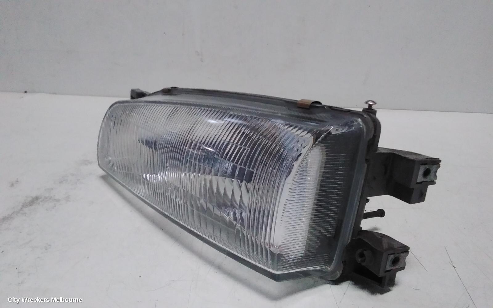 SUBARU IMPREZA LEFT HEADLAMP, CLEAR LENS TYPE, ICHIKOH HXFOOL, 11/1996 - 09/2000