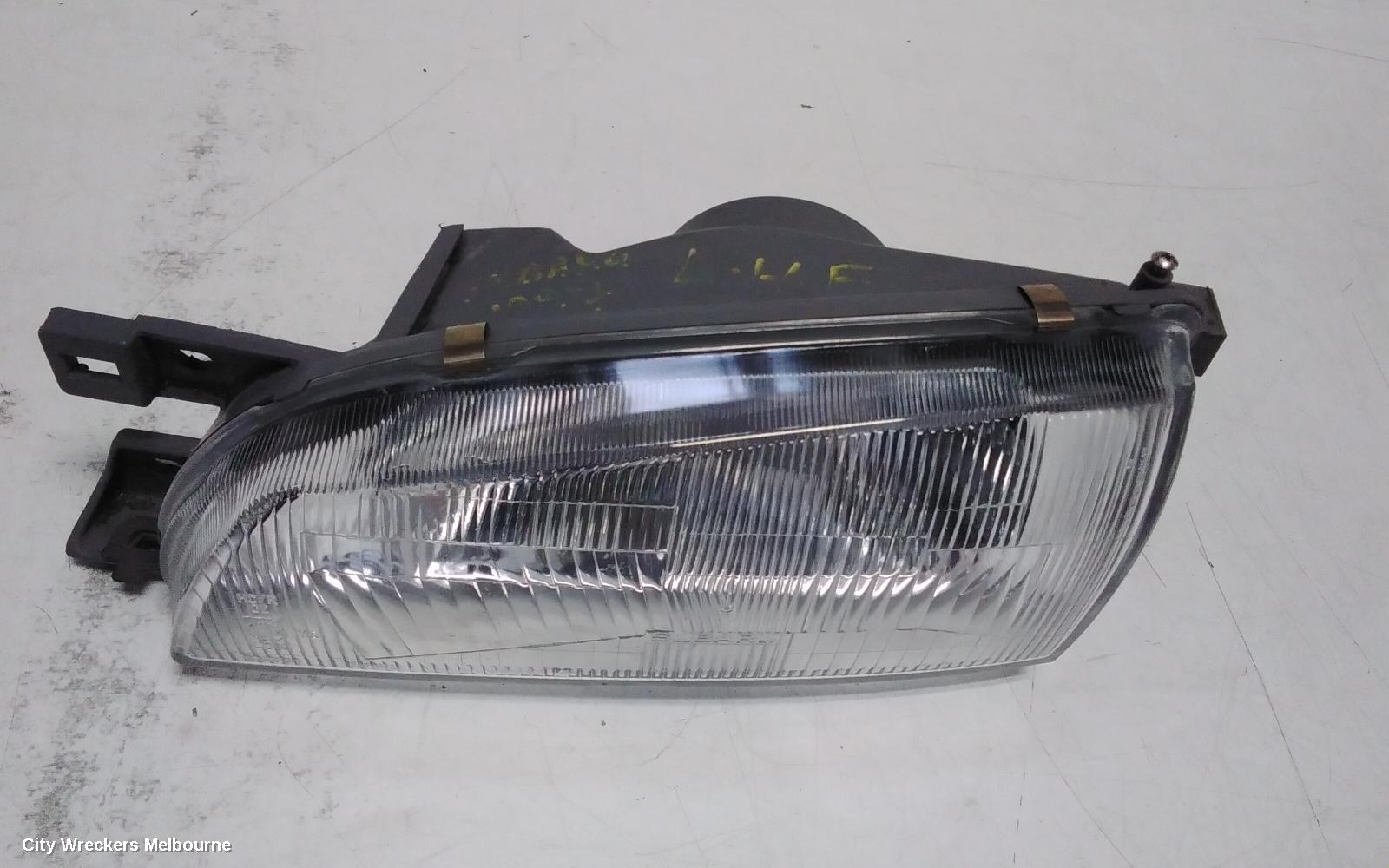 SUBARU IMPREZA LEFT HEADLAMP, CLEAR LENS TYPE, ICHIKOH HXFOOL, 11/1996 - 09/2000