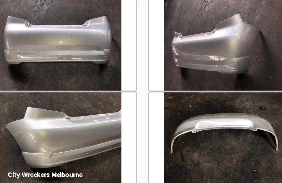 HOLDEN BARINA REAR BUMPER, BUMPER BAR (COMPLETE), TK, 5DR HATCH, 12/2005 - 06/2008