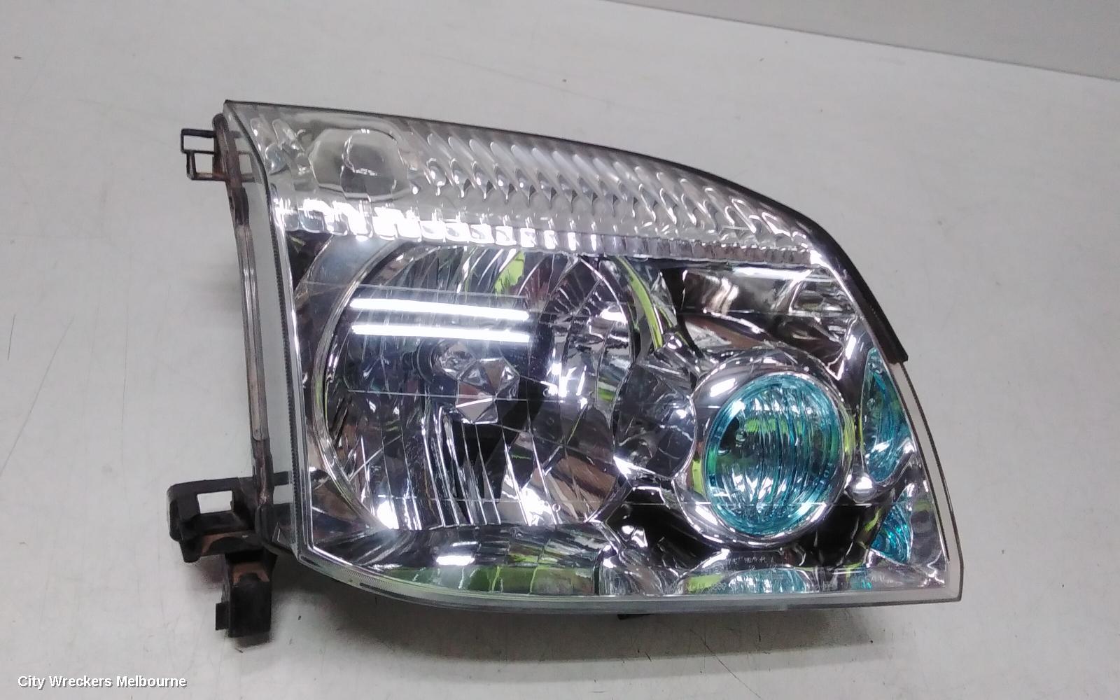 NISSAN XTRAIL RIGHT HEADLAMP, T30, BLUE LENS TYPE, 10/2001 - 09/2007