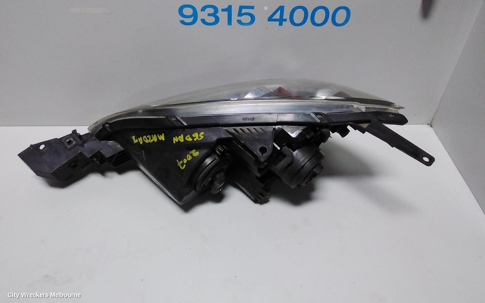 MAZDA 3 RIGHT HEADLAMP, BK, HATCH, NON HID, MANUAL ADJUST TYPE, 10/2003 - 04/2009