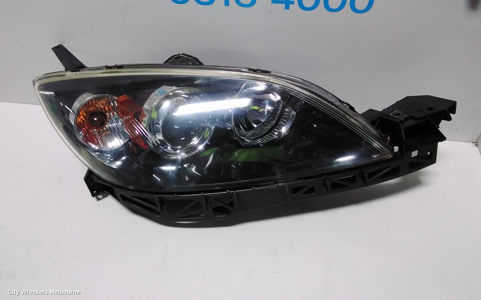 MAZDA 3 RIGHT HEADLAMP, BK, HATCH, NON HID, MANUAL ADJUST TYPE, 10/2003 - 04/2009