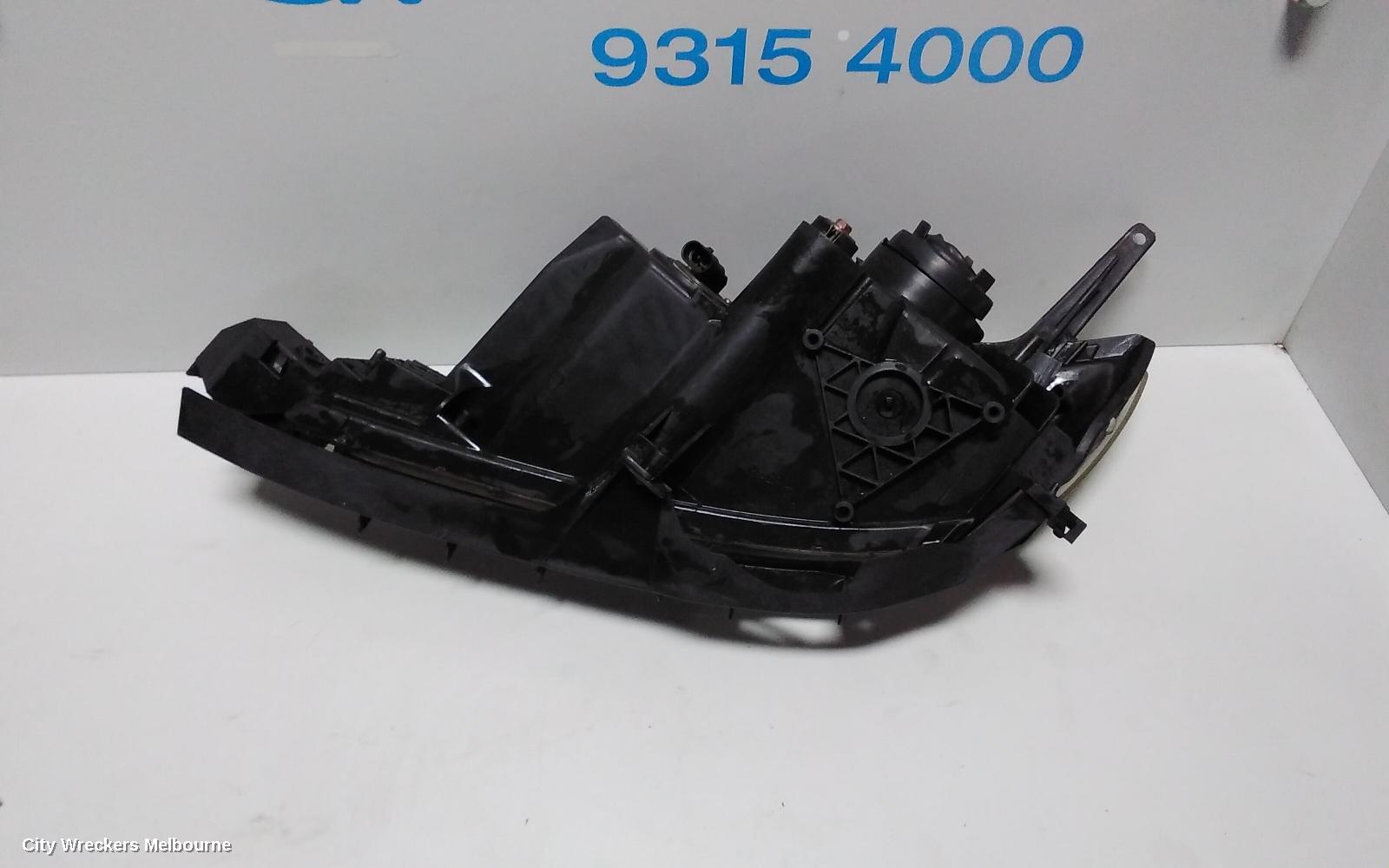 MAZDA 3 RIGHT HEADLAMP, BK, HATCH, NON HID, MANUAL ADJUST TYPE, 10/2003 - 04/2009