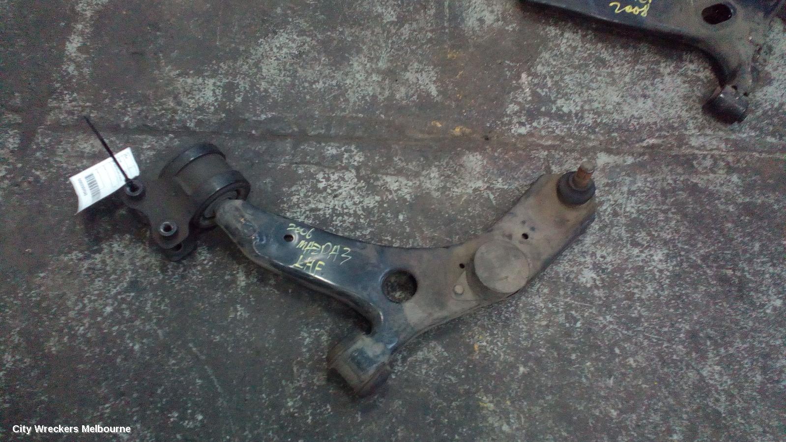 MAZDA 3 LEFT FRONT LOWER CONTROL ARM, BK, NON MPS/MPS, 01/2004 - 04/2009
