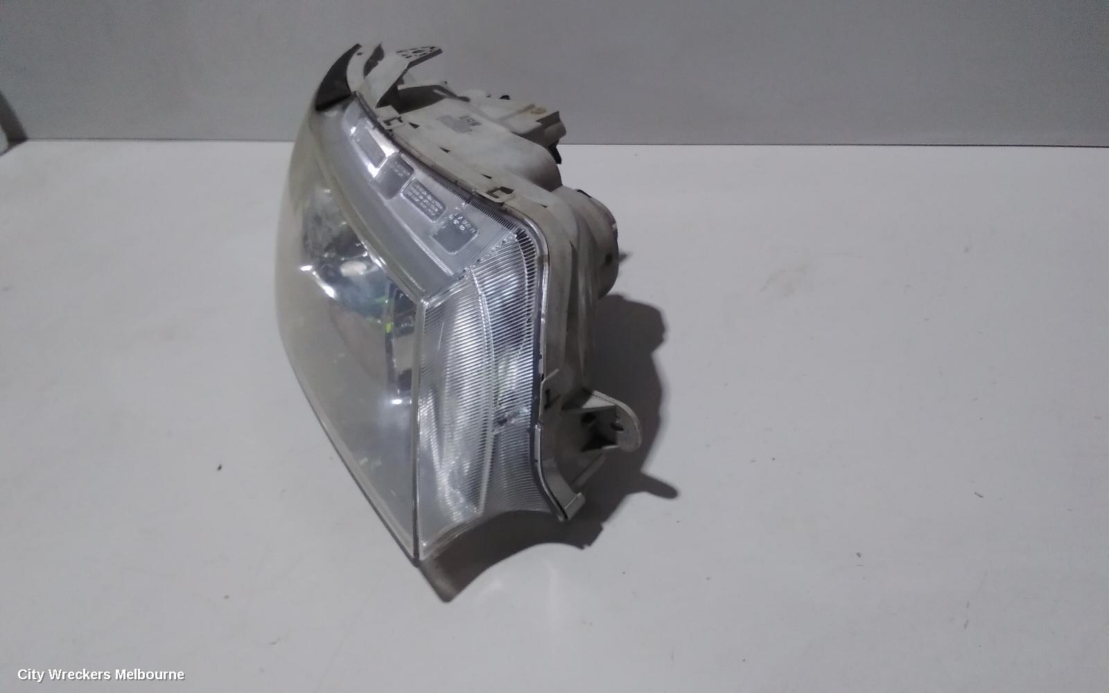 HOLDEN COMMODORE RIGHT HEADLAMP, VZ, ADVENTRA/BERLINA, PROJECTOR TYPE (CHROME), 08/2004 - 09/2007
