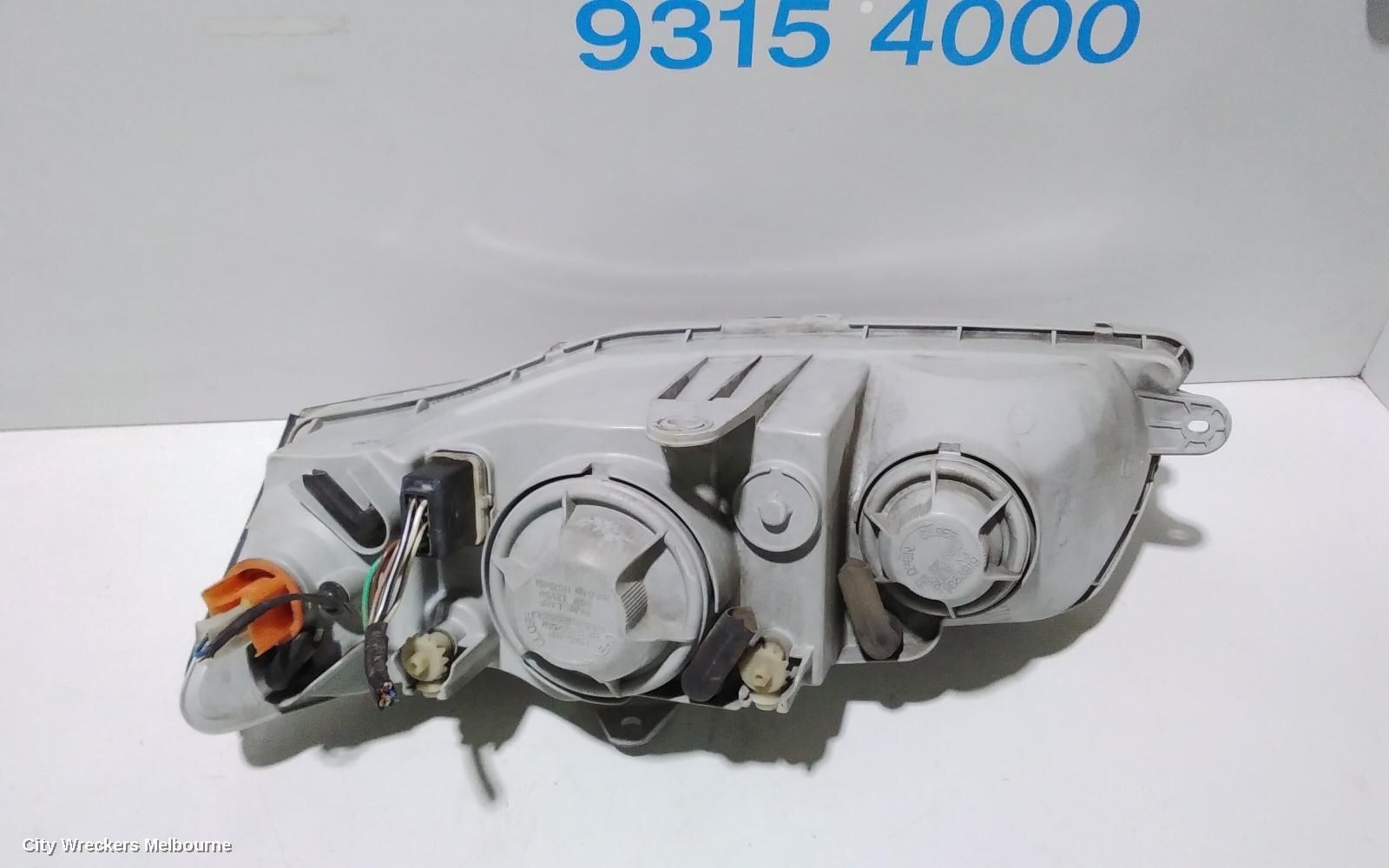 HOLDEN COMMODORE RIGHT HEADLAMP, VZ, ADVENTRA/BERLINA, PROJECTOR TYPE (CHROME), 08/2004 - 09/2007