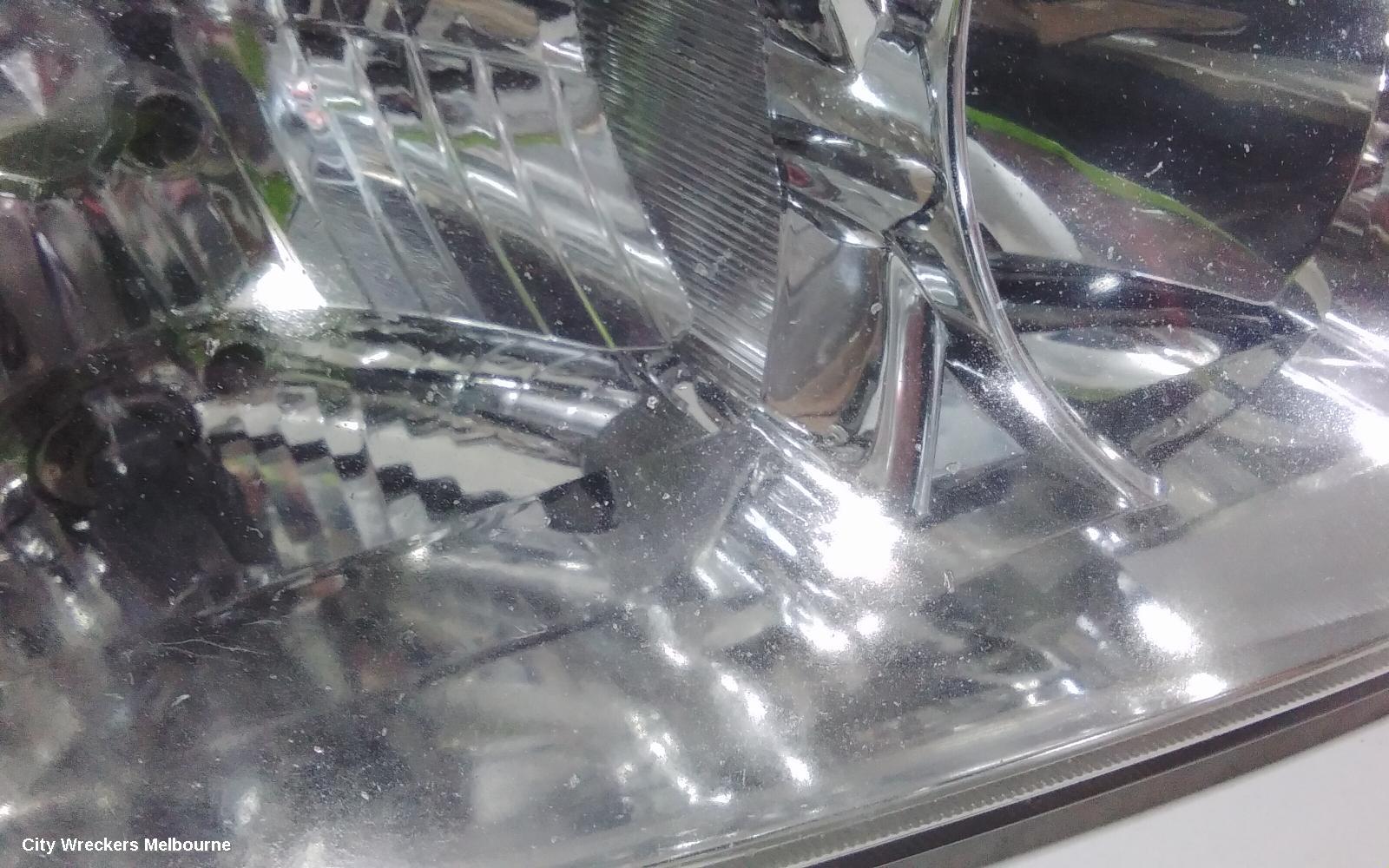 HOLDEN COMMODORE RIGHT HEADLAMP, VZ, ADVENTRA/BERLINA, PROJECTOR TYPE (CHROME), 08/2004 - 09/2007