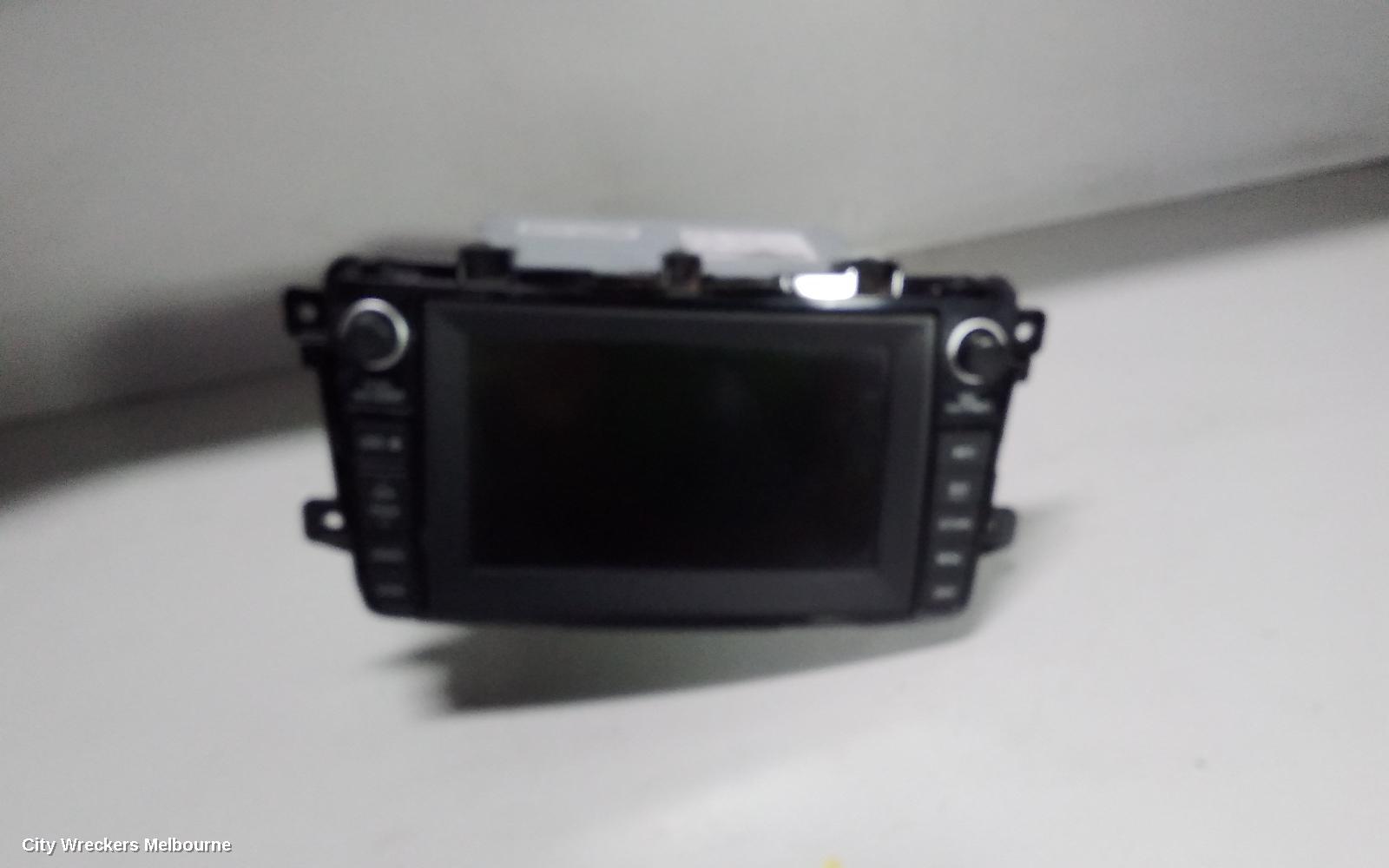 MAZDA CX9 RADIO/CD/DVD/SAT/TV, DISPLAY UNIT, SAT NAV TYPE (P/N TE7766DV0), 09/2008 - 11/2012