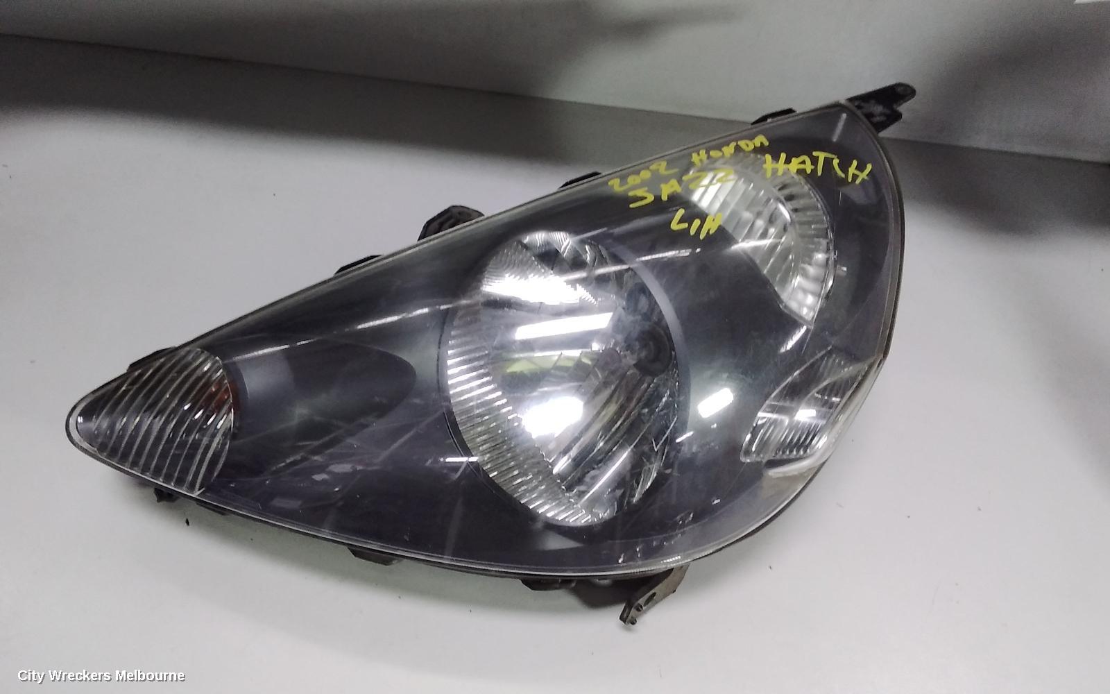 HONDA JAZZ LEFT HEADLAMP, GD, BLACK INSERT TYPE, LENS# P2188, 10/2002 - 09/2004