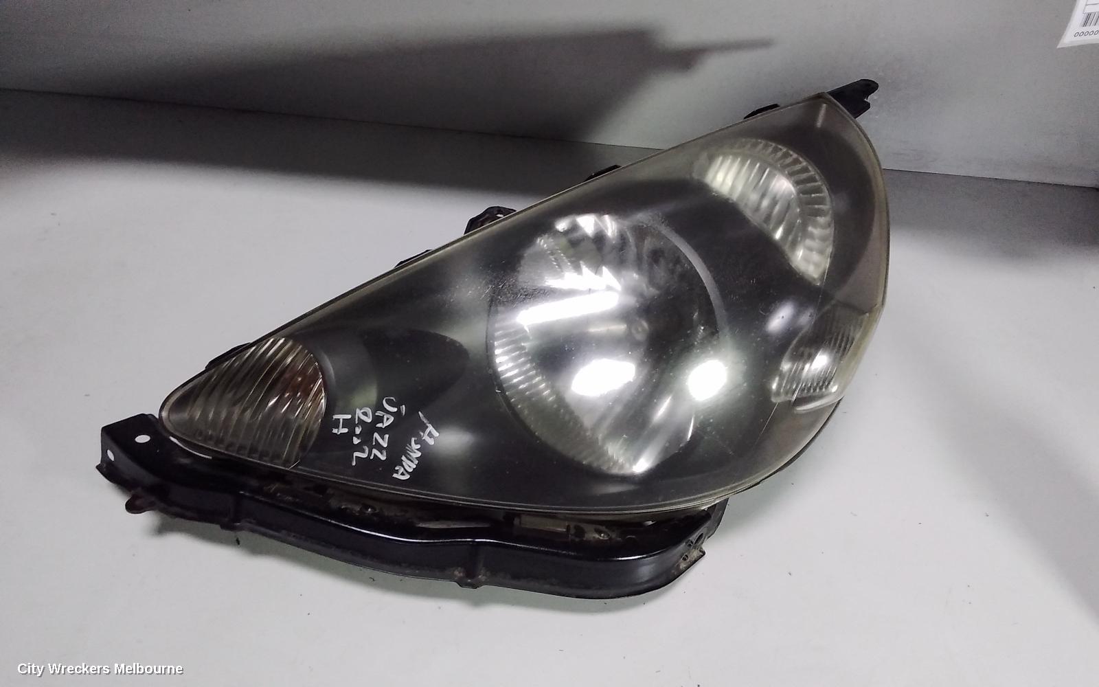 HONDA JAZZ LEFT HEADLAMP, GD, BLACK INSERT TYPE, LENS# P1680, 10/2002 - 09/2004