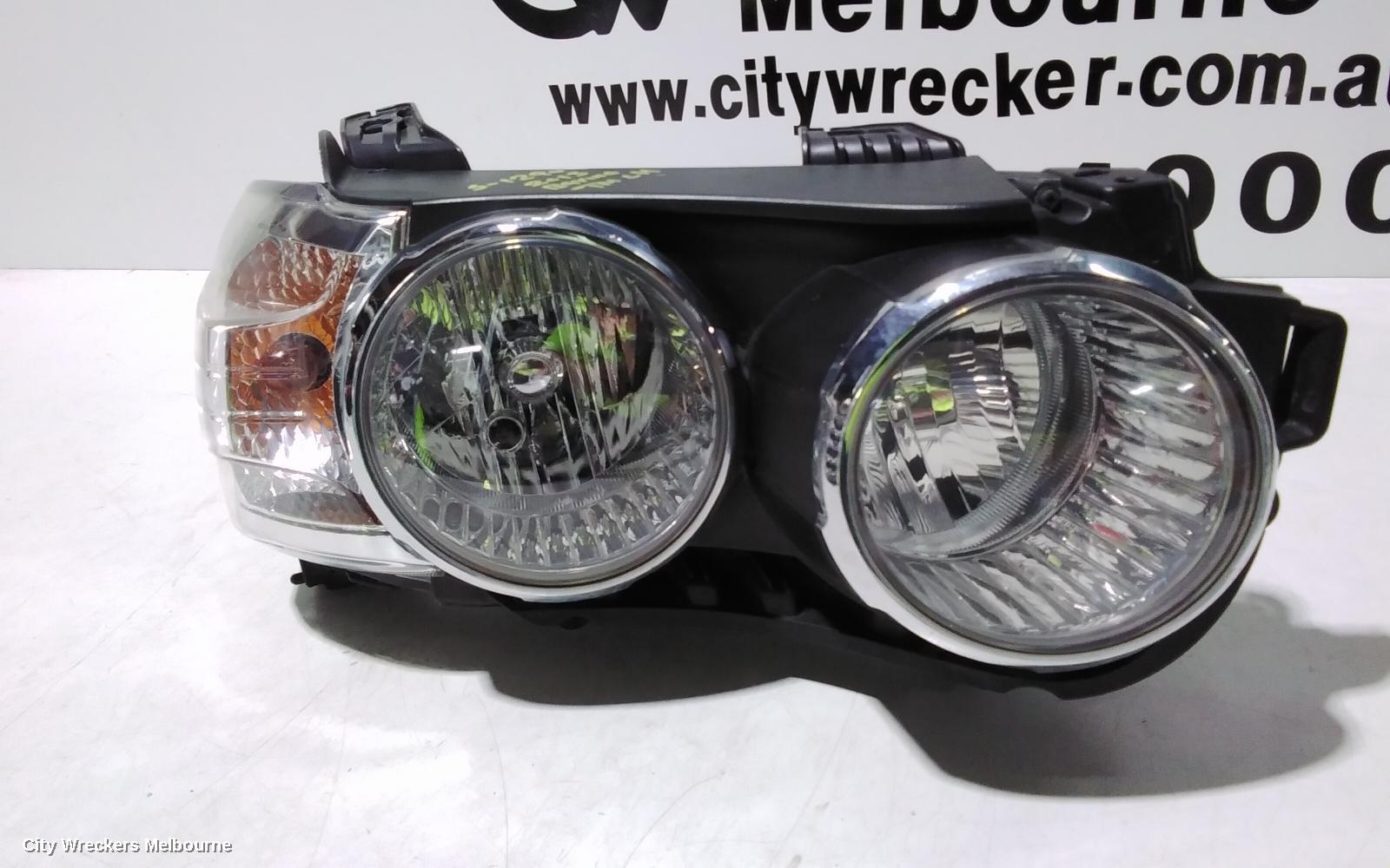 HOLDEN BARINA RIGHT HEADLAMP, TM, W/ CHROME RING TYPE, 11/2011 - 08/2016