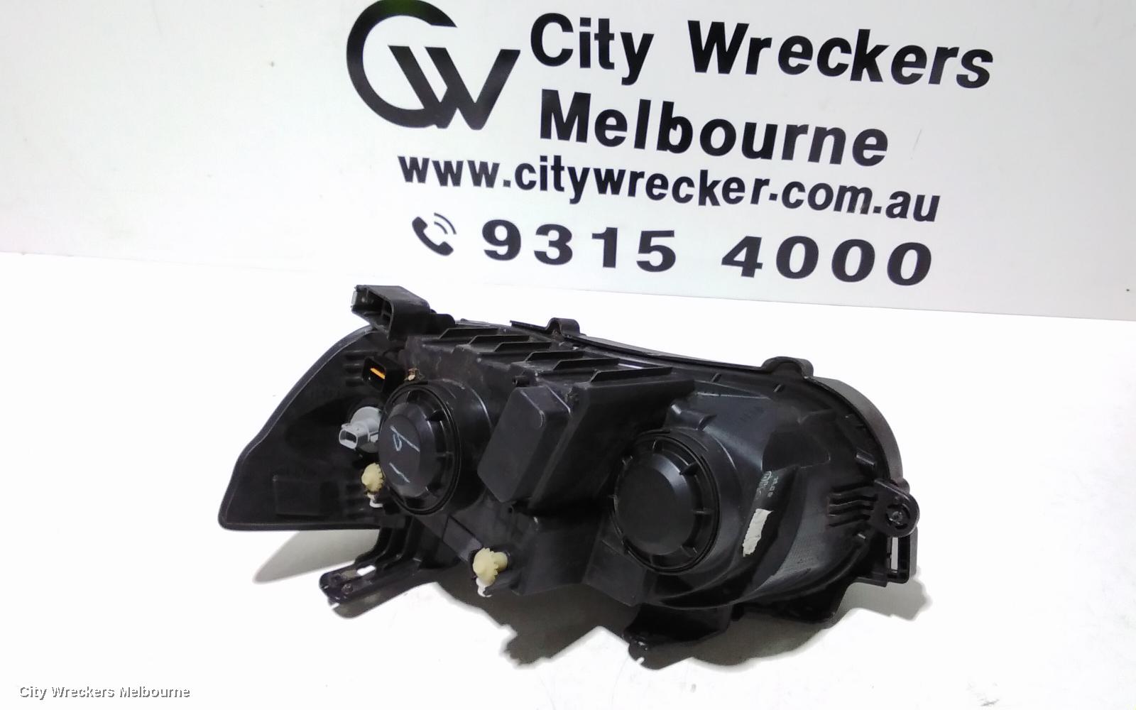 HOLDEN BARINA RIGHT HEADLAMP, TM, W/ CHROME RING TYPE, 11/2011 - 08/2016